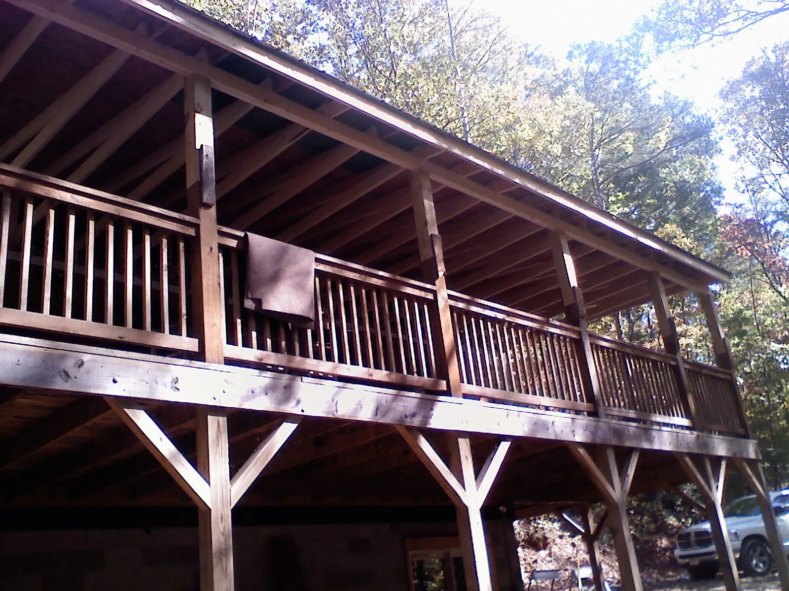 Timber framing under a new elevated porch and deck — Roof Leak Repair in Efland by Roofing Brothers